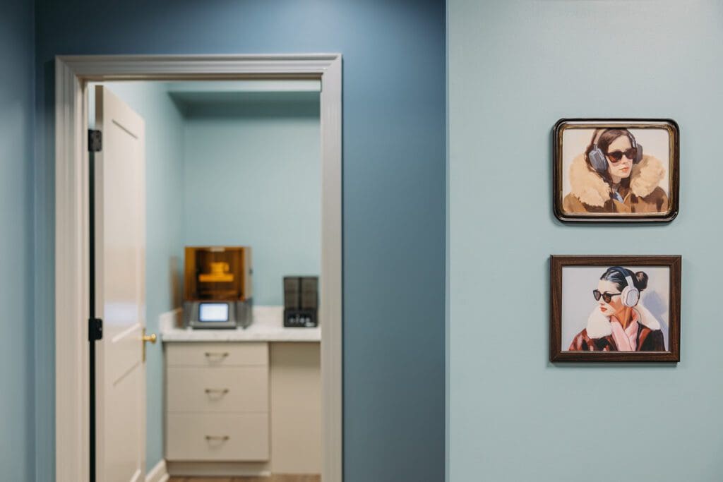 framed paintings on wall